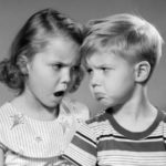 1950s BOY GIRL HEAD TO HEAD ANGRY FACIAL EXPRESSIONS ARGUMENT FIGHT
