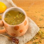 54597268-st-johns-wort-tea-and-surrounded-by-dried-kantarion-plants