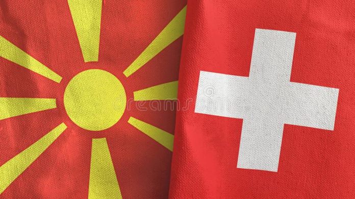 switzerland-north-macedonia-two-flags-textile-cloth-d-rendering-switzerland-north-macedonia-two-folded-flags-together-d-200362192